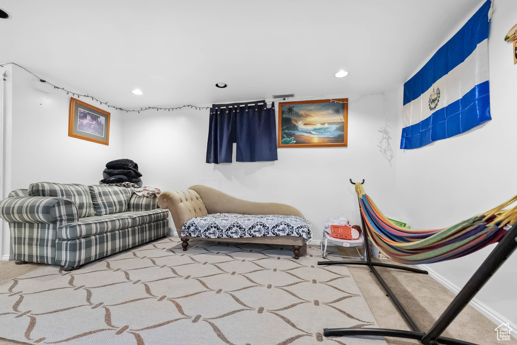 Interior space featuring recessed lighting, baseboards, and carpet