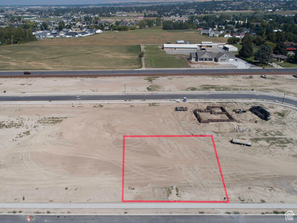 Aerial overview of property's location with property parcel outlined