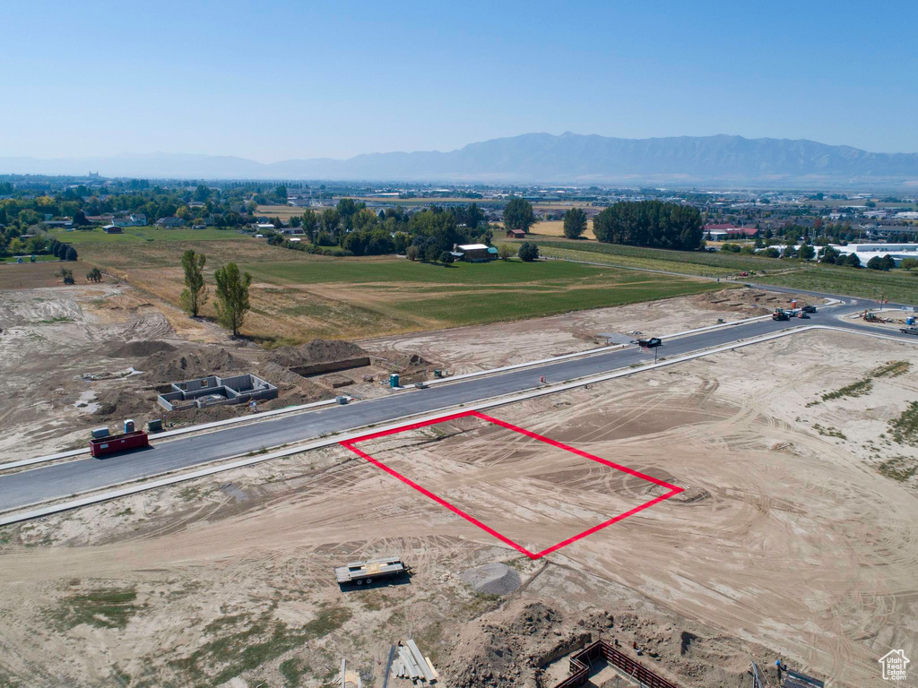 View of rural area featuring property parcel outlined and mountains
