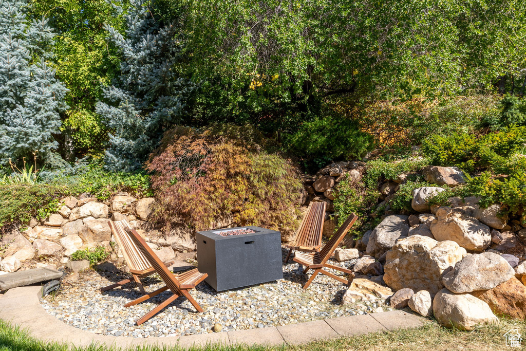 View of yard featuring a fire pit