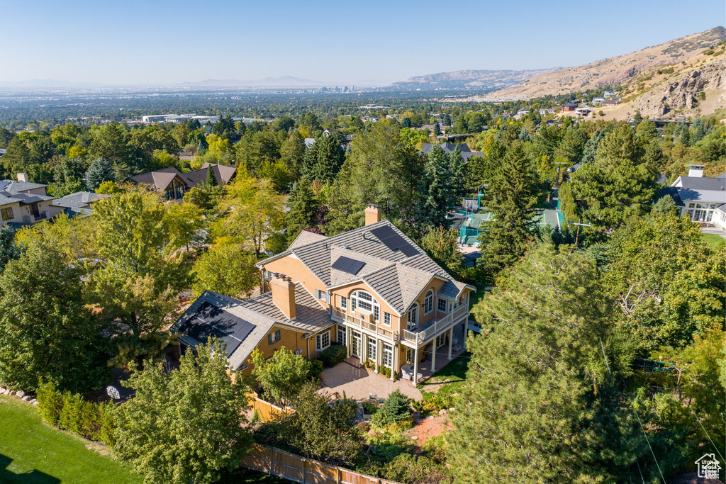 View of subject property with a mountain backdrop