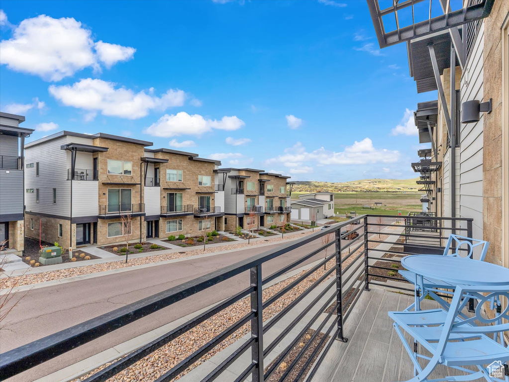 Balcony featuring a residential view