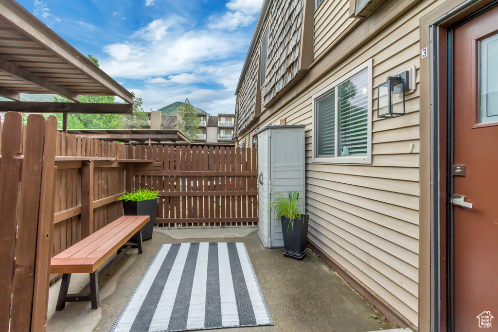 View of patio / terrace featuring fence
