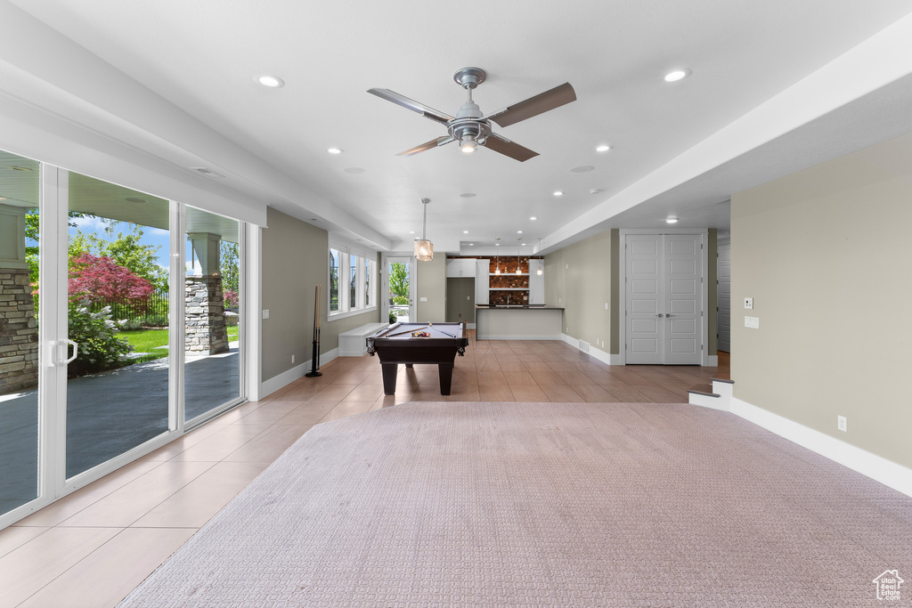 Rec room with billiards table, recessed lighting, ceiling fan, a dry bar, and light tile patterned floors