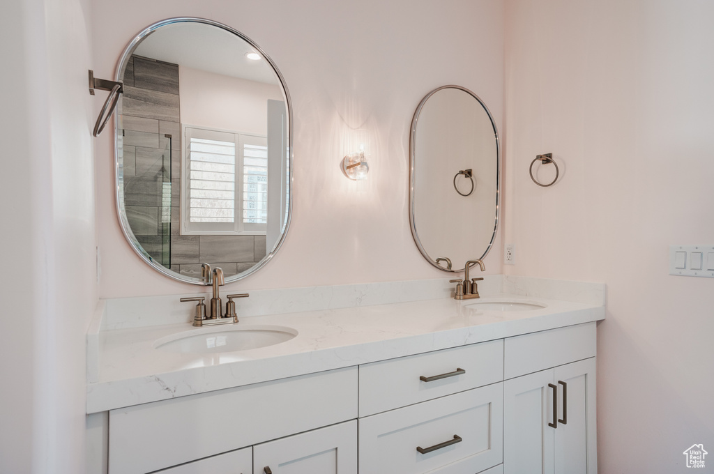 Full bathroom featuring double vanity