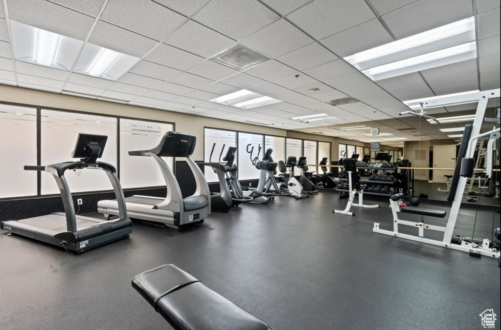 Exercise room featuring a drop ceiling