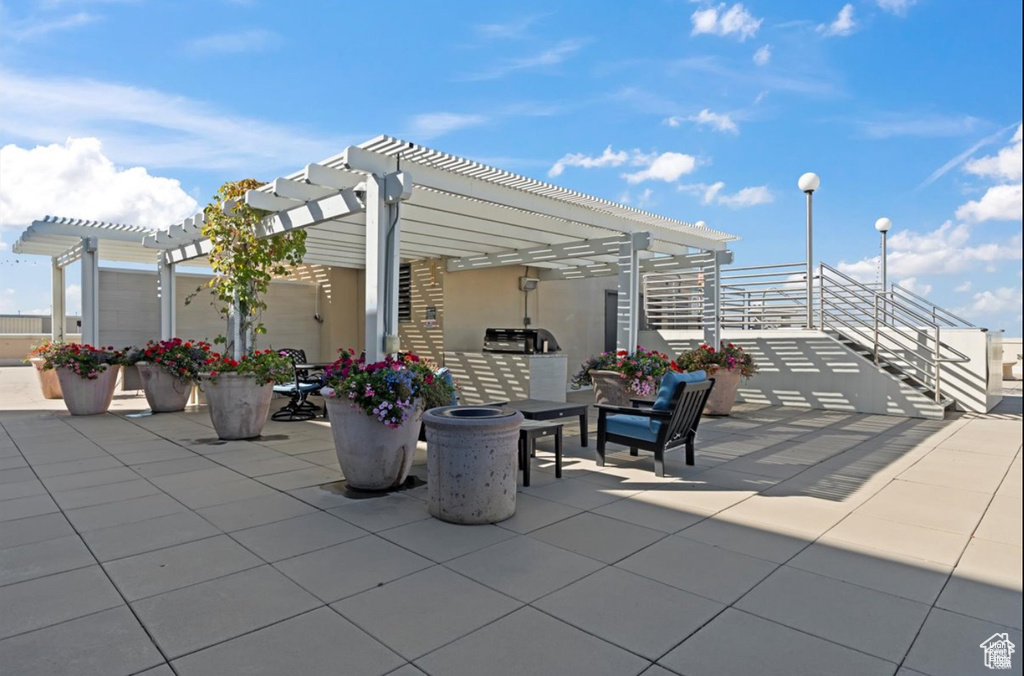 View of patio featuring a pergola