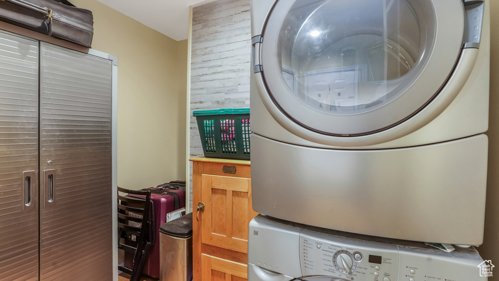 Laundry area with stacked washer / dryer