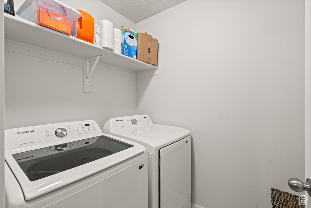 Clothes washing area with washer and dryer
