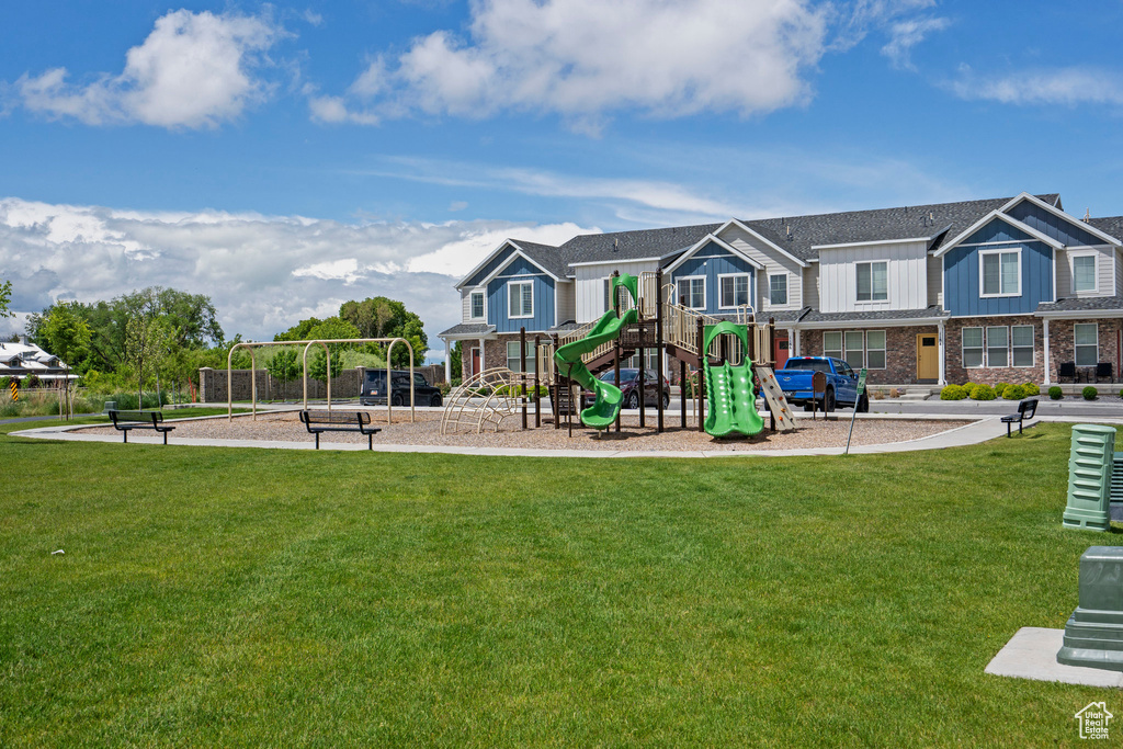 Community playground featuring a yard