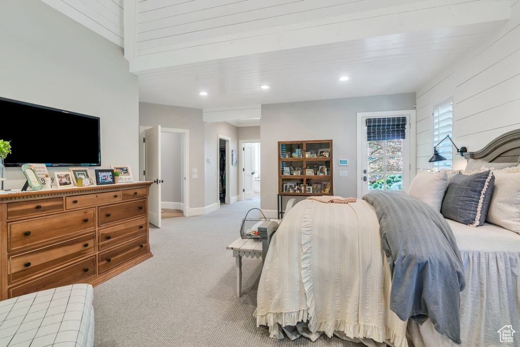 Bedroom featuring light colored carpet, access to outside, recessed lighting, and baseboards