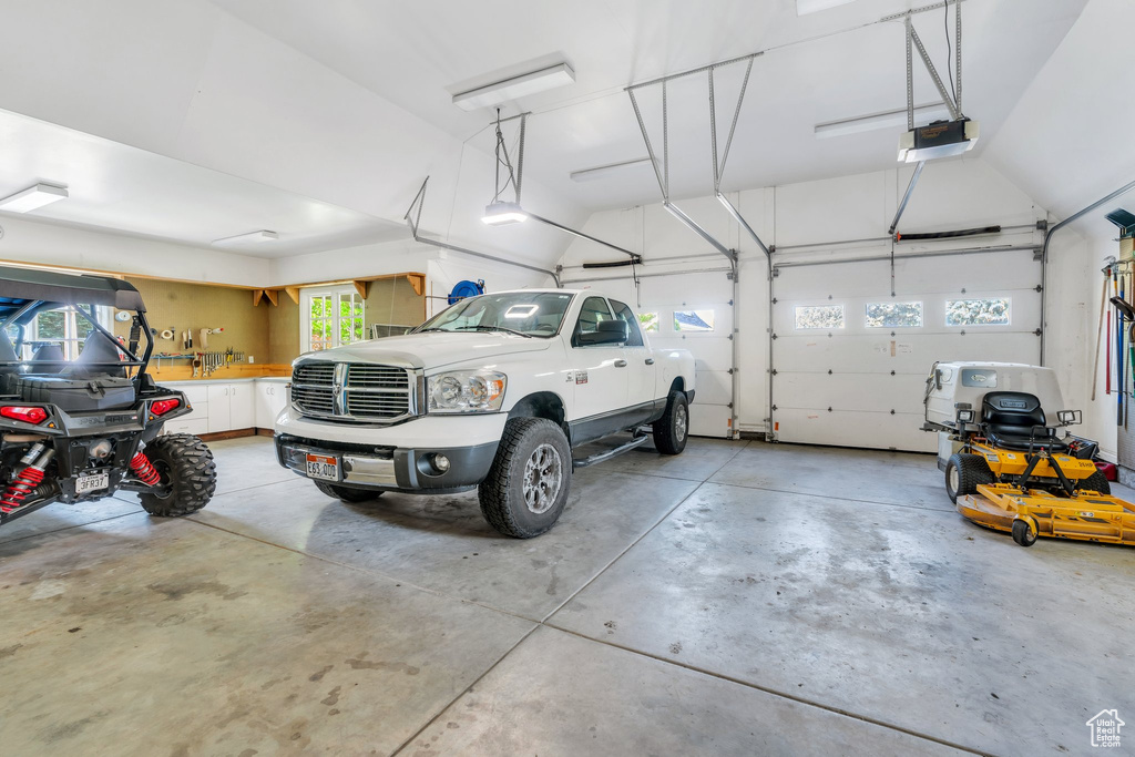 Garage featuring a garage door opener