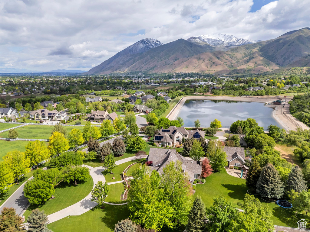 Aerial view of residential area with a water and mountain view