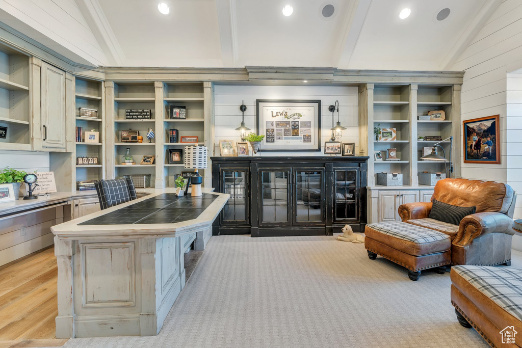 Living room featuring light wood finished floors, ornamental molding, and recessed lighting