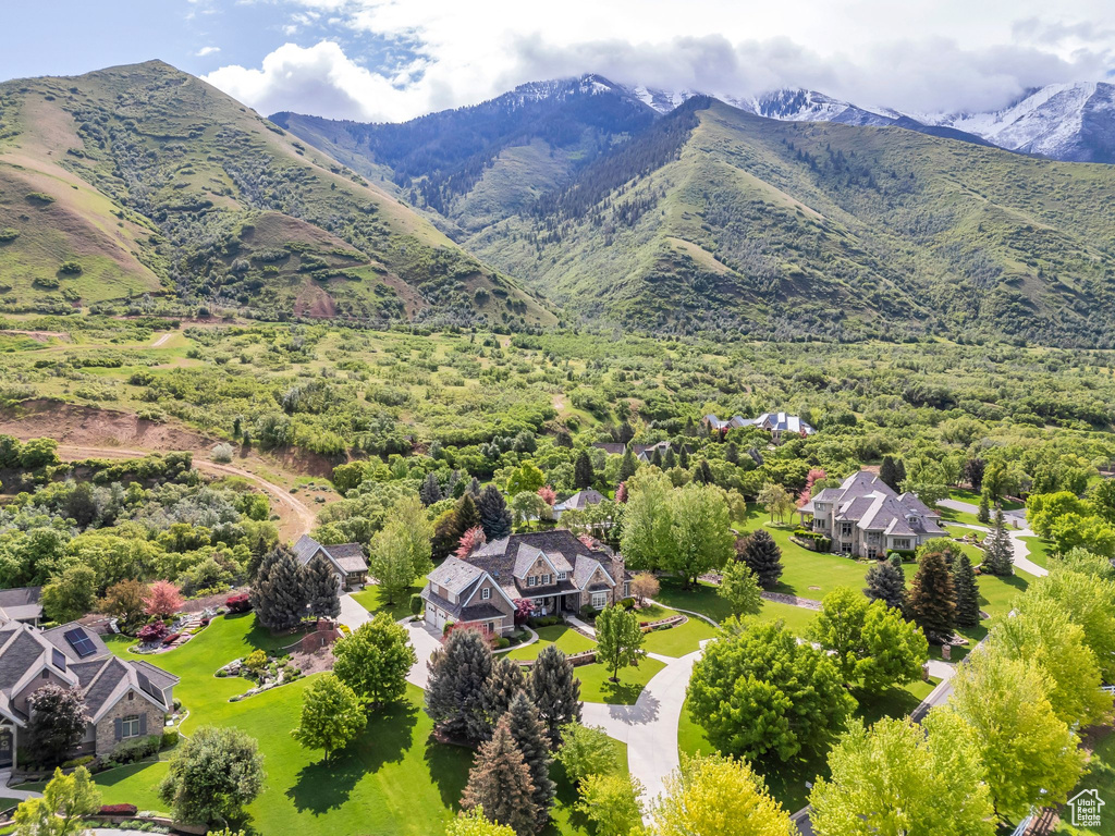 Aerial view of residential area featuring mountains