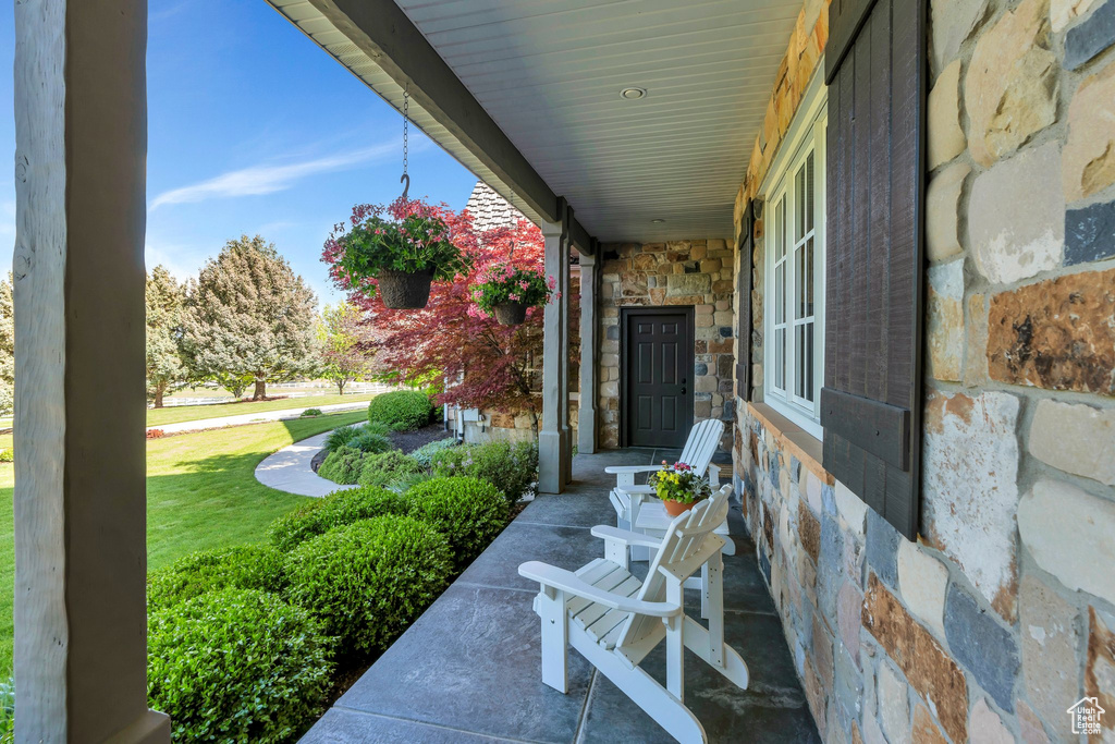 View of patio featuring a porch
