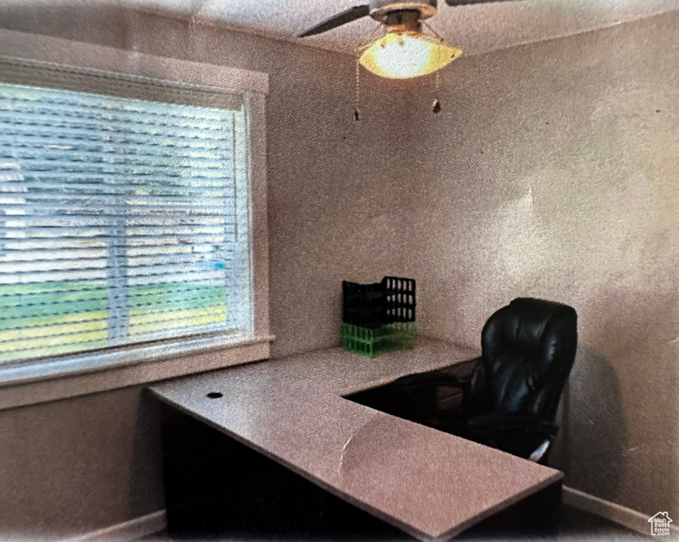 Office area featuring ceiling fan