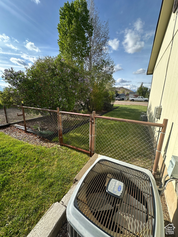 Exterior view of fence and cooling unit