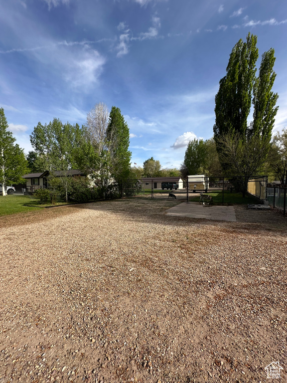 View of yard with fence