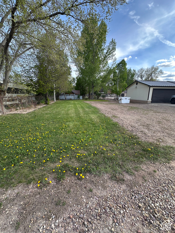 View of yard with fence