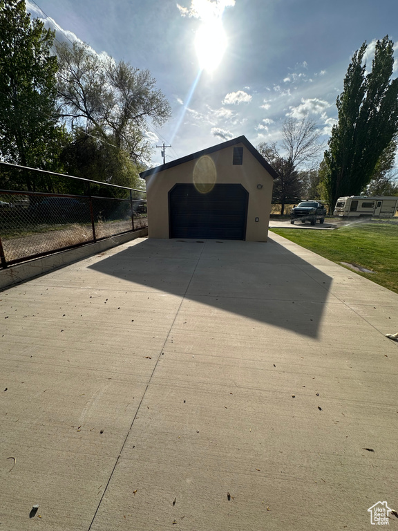 Detached garage with fence