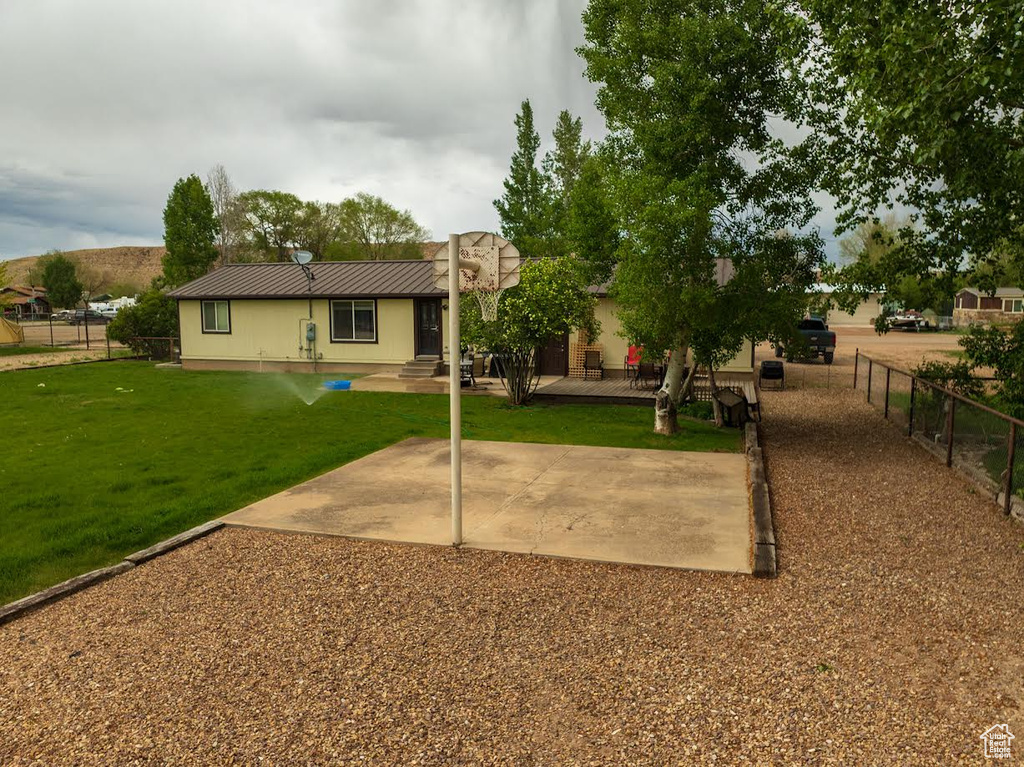 Rear view of house with metal roof