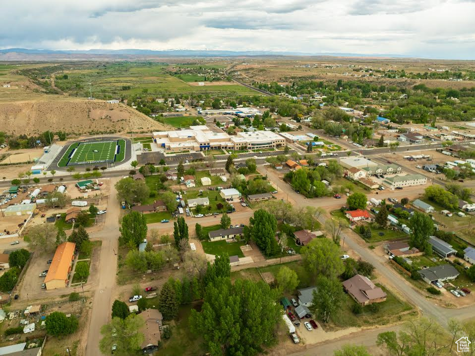 Aerial overview of property's location with mountains