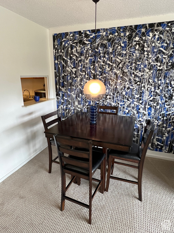 View of carpeted dining room