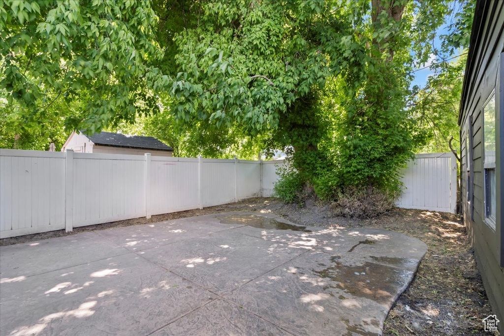 View of patio featuring a fenced backyard