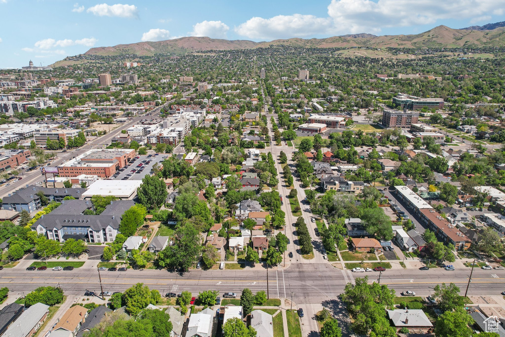 Aerial view of property's location featuring mountains