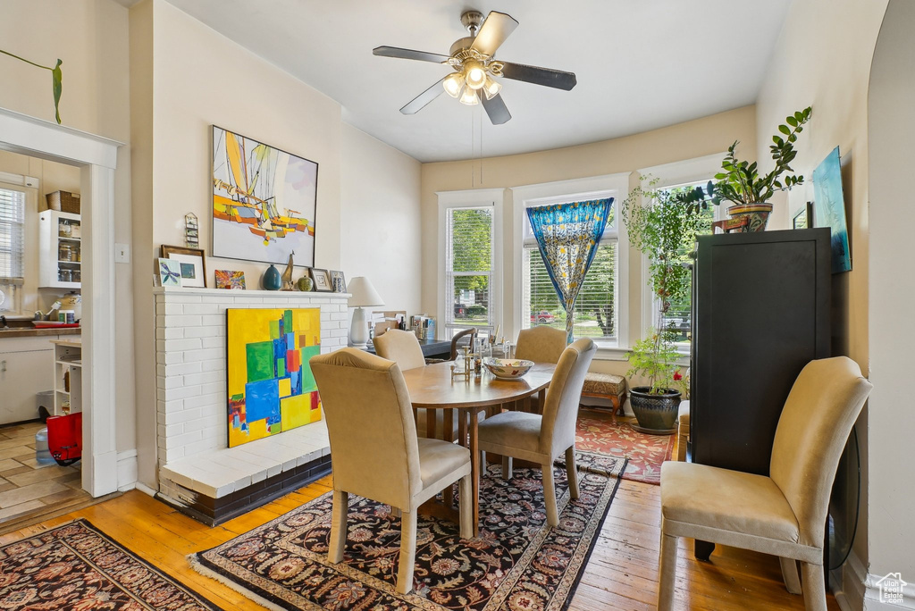 Dining space featuring light wood finished floors and ceiling fan