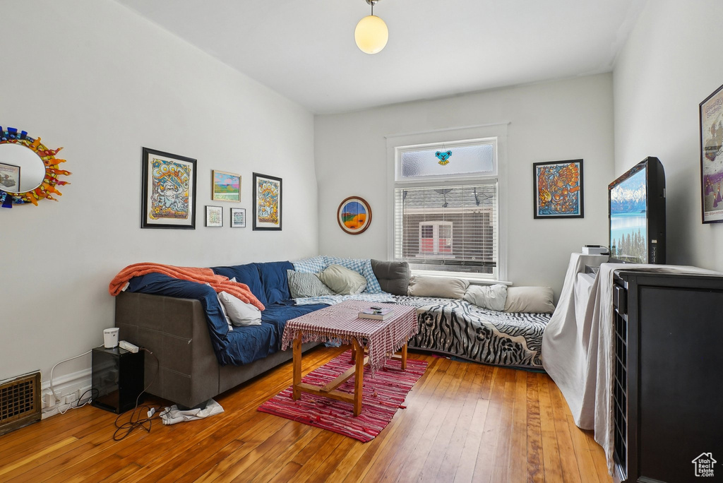 Living room featuring wood-type flooring