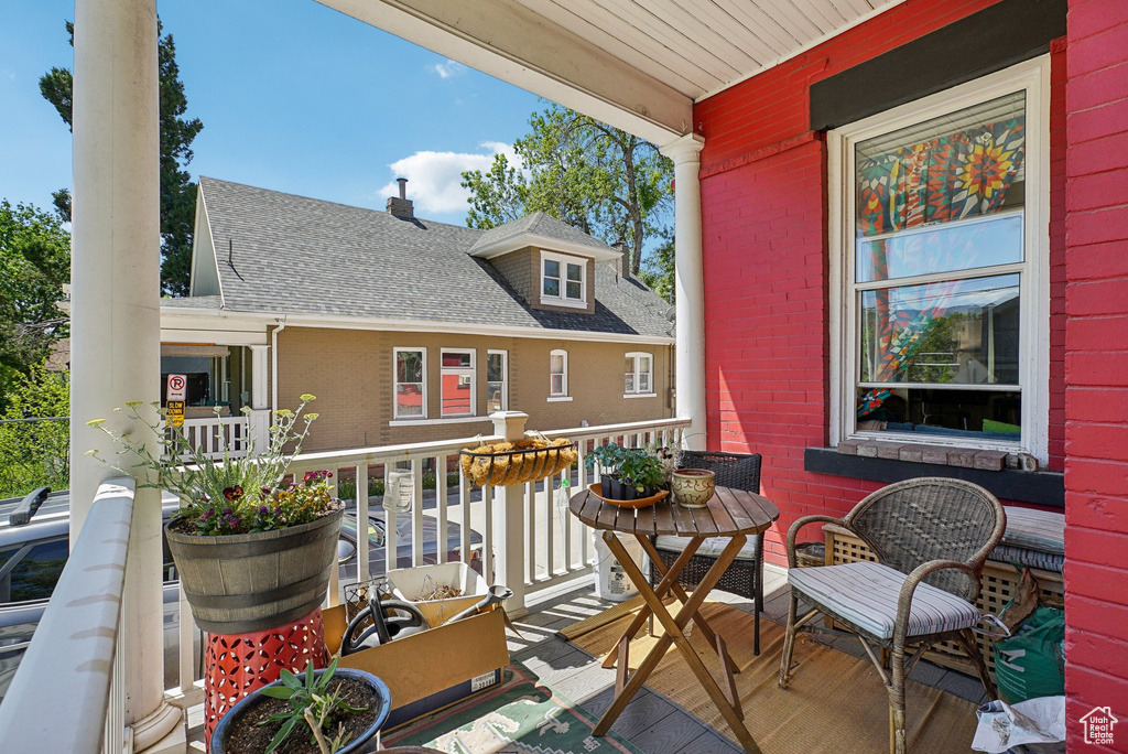 Balcony featuring covered porch