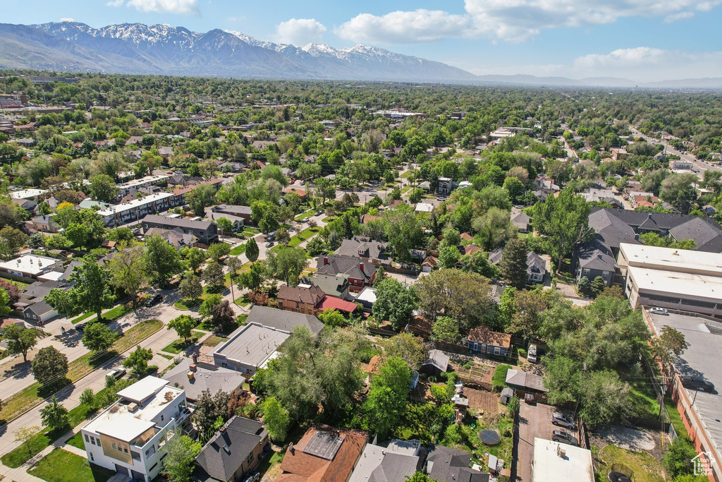 Aerial view of residential area with a mountainous background