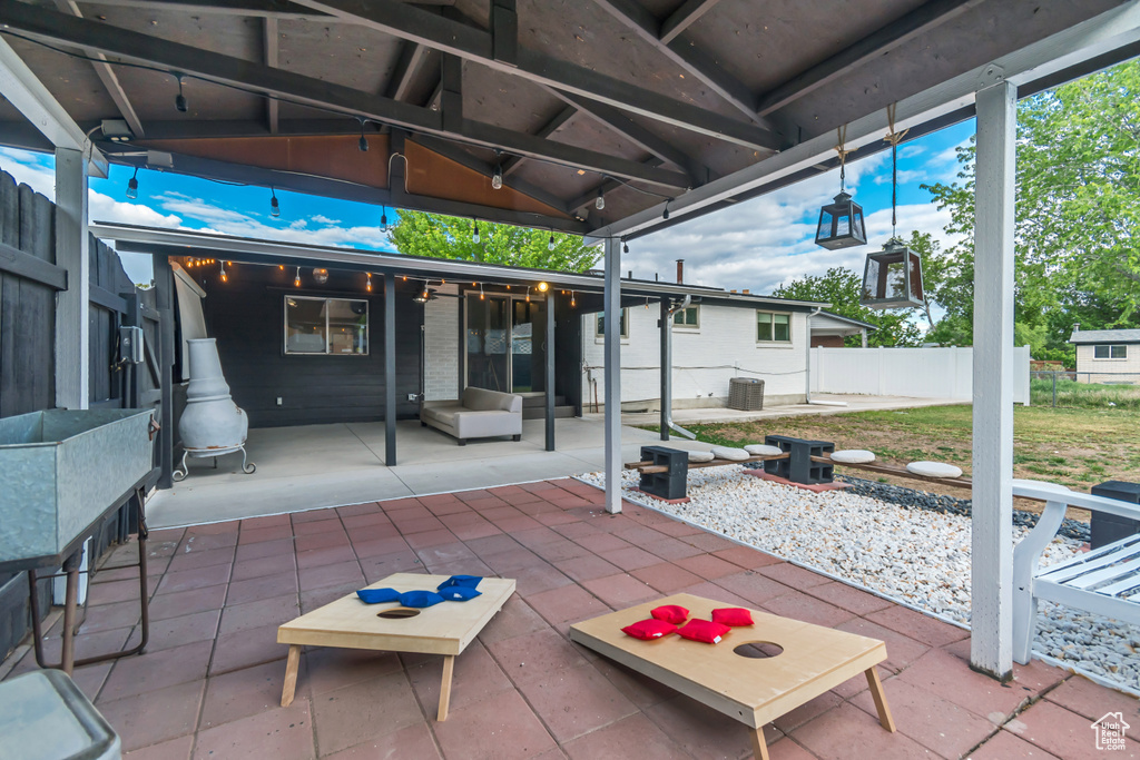View of patio / terrace with fence and central air condition unit