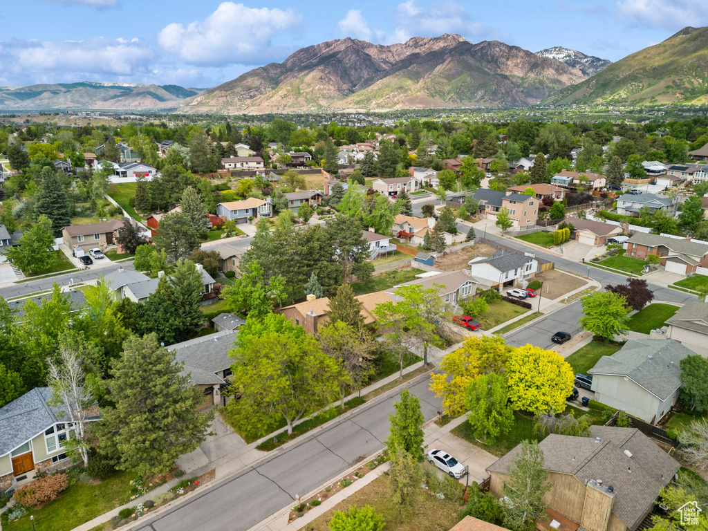 Aerial view of residential area with a mountainous background