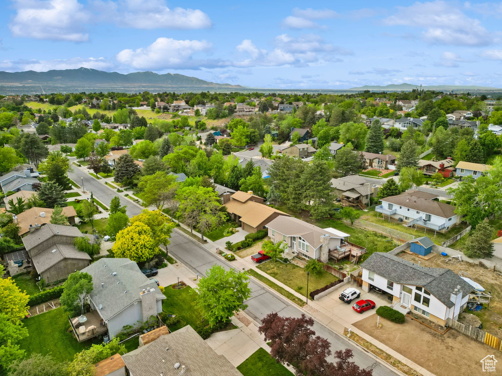 Aerial view of residential area with mountains