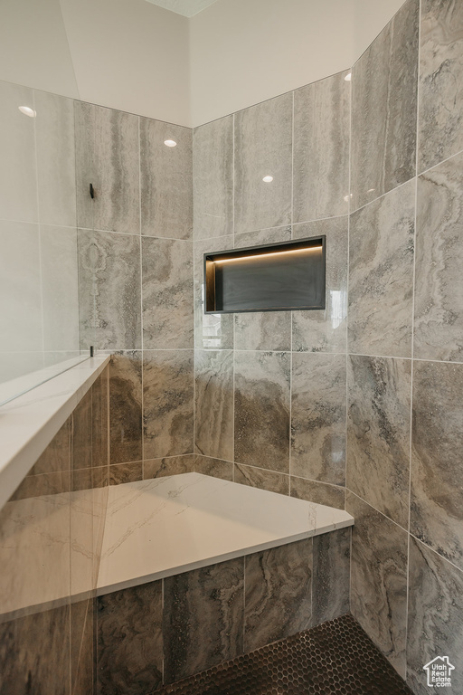Full bath with tiled shower
