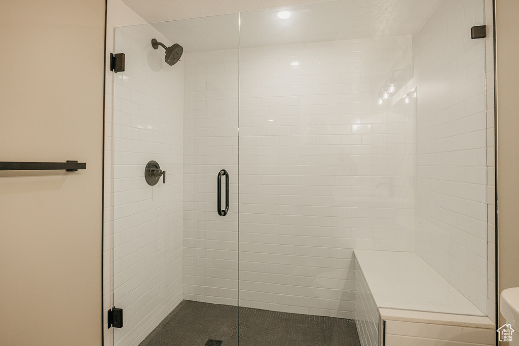 Full bathroom with a stall shower