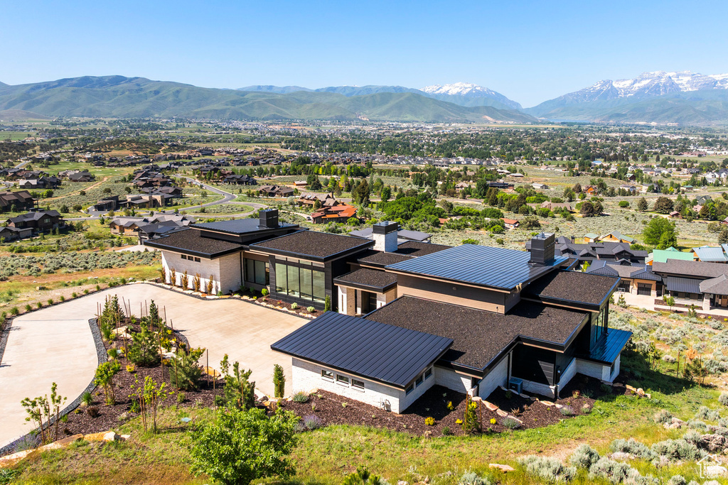 Aerial perspective of suburban area featuring mountains