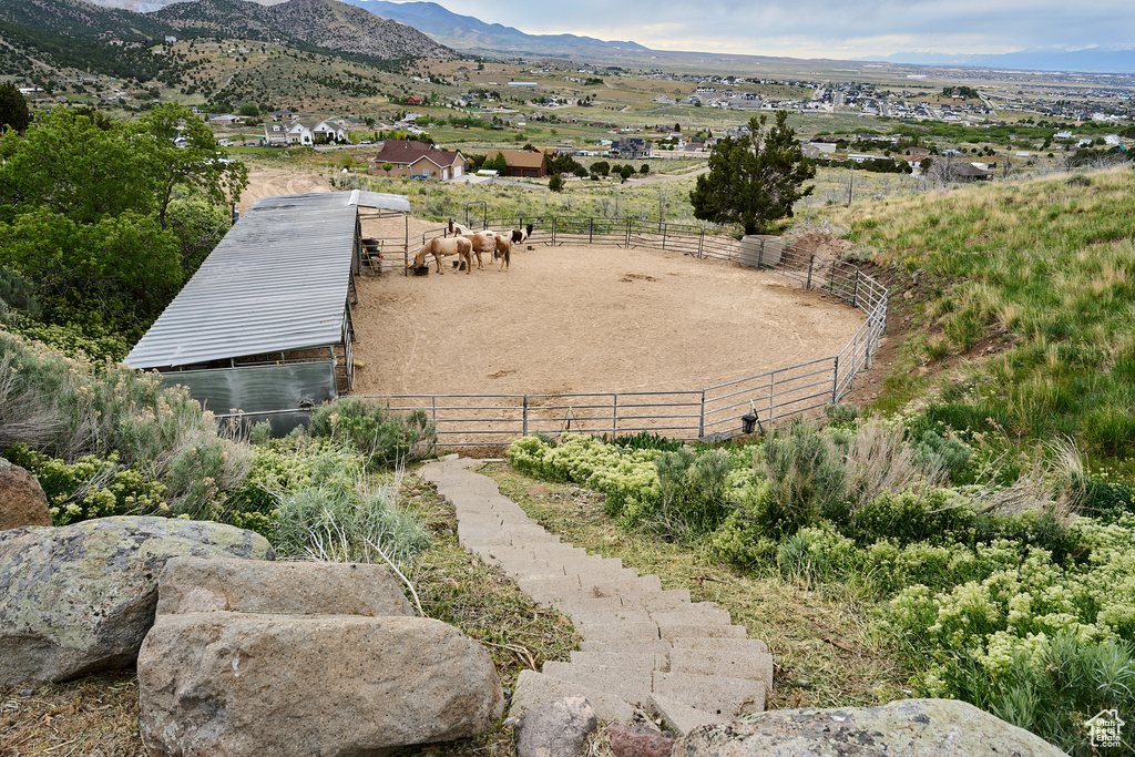 View of mountain background featuring rural landscape