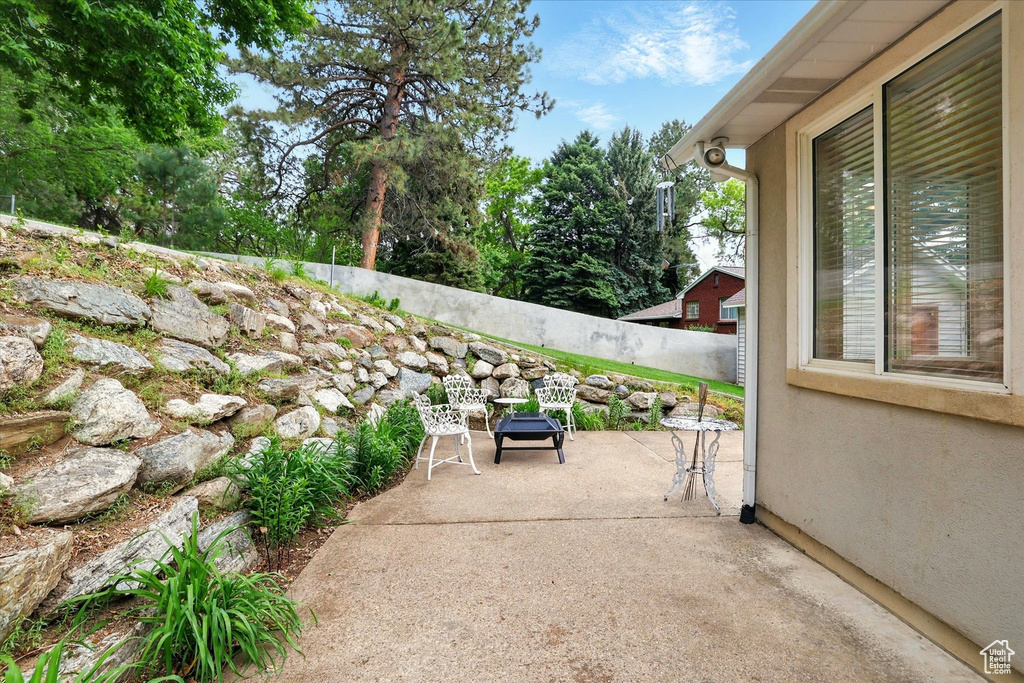 View of patio / terrace featuring fence