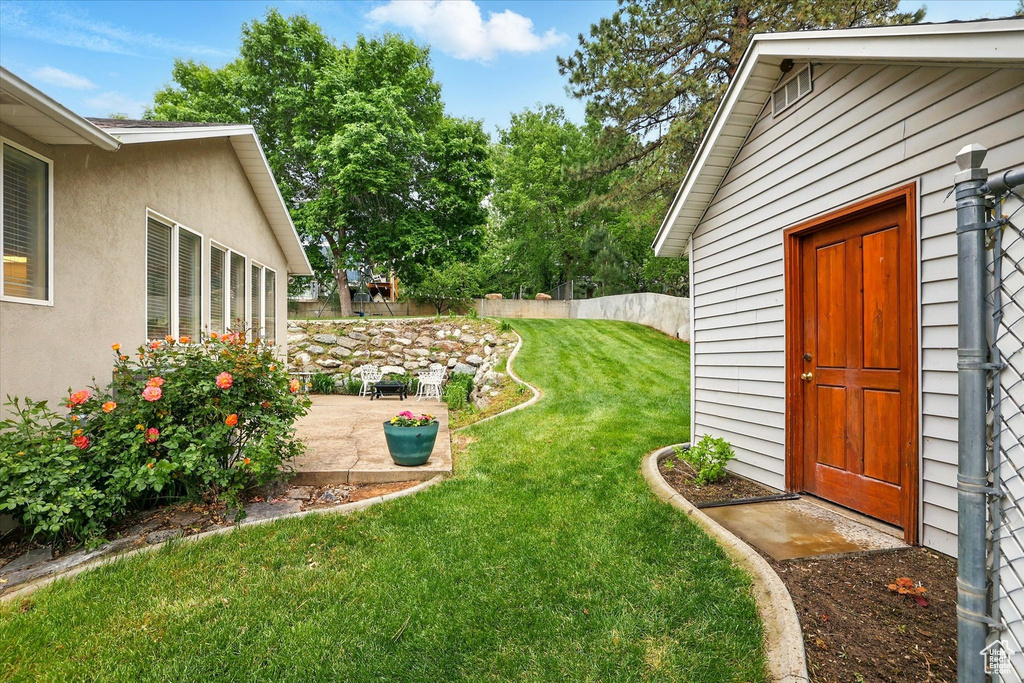 View of yard featuring a patio area