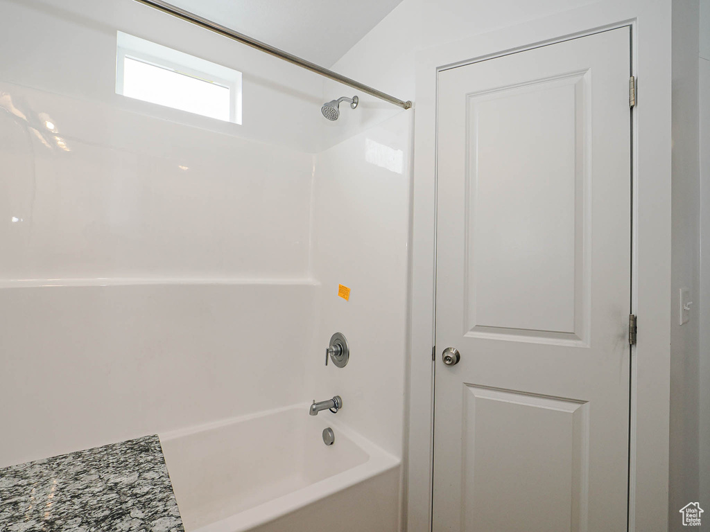 Full bathroom with  shower combination