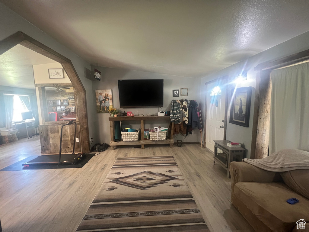 Living area with wood finished floors