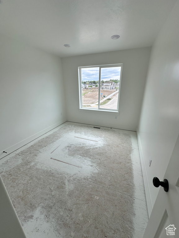 Spare room with baseboards