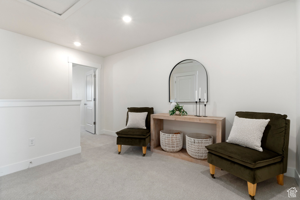 Sitting room with carpet floors, recessed lighting, and baseboards