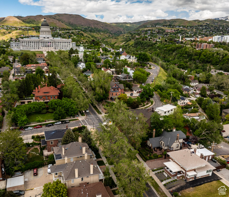 Aerial view of residential area with a mountain backdrop