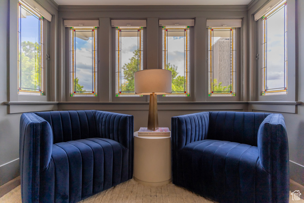 Sitting room featuring crown molding