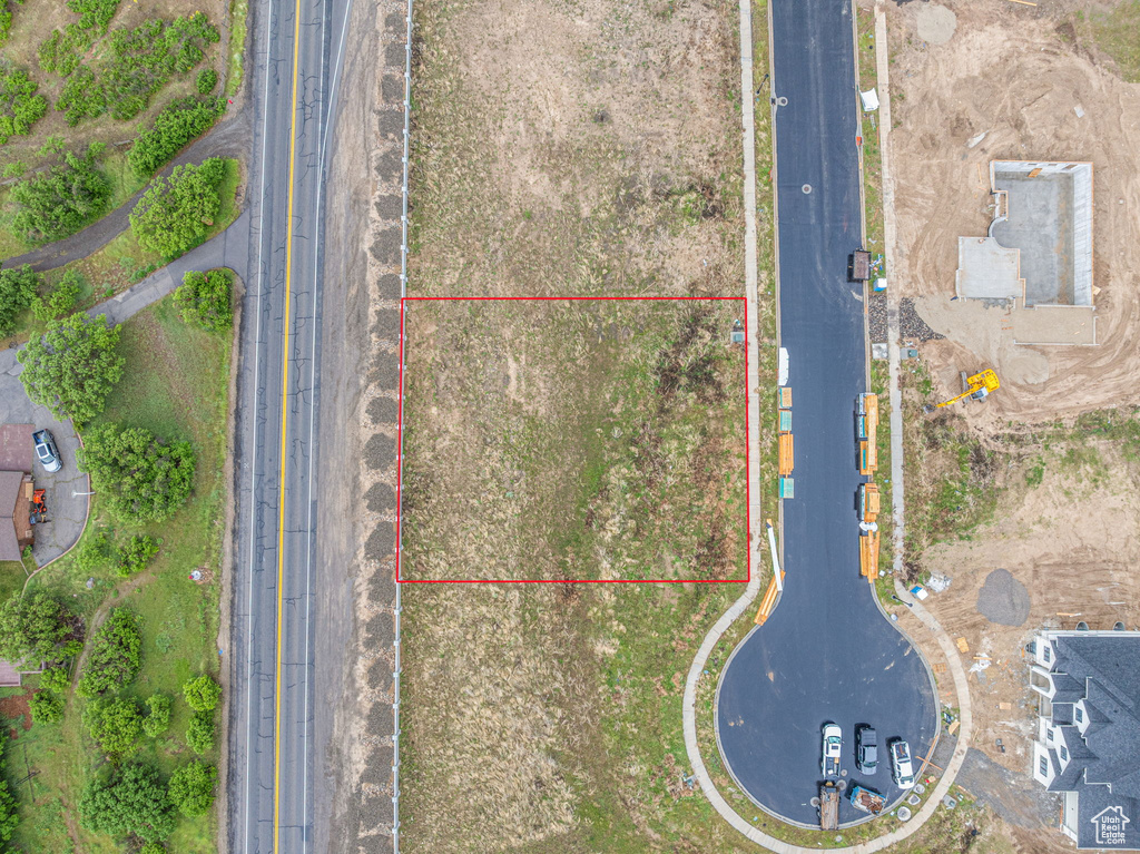 Aerial overview of property\'s location featuring property boundaries highlighted